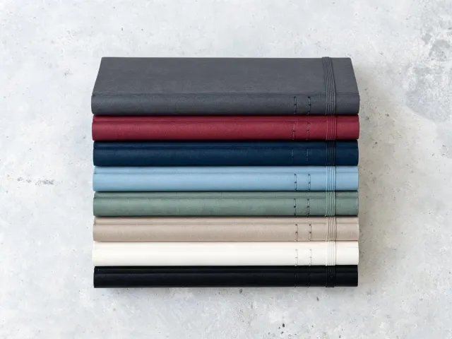 Stacked Leuchtturm1917 hardcover medium A5 notebooks in eight colors